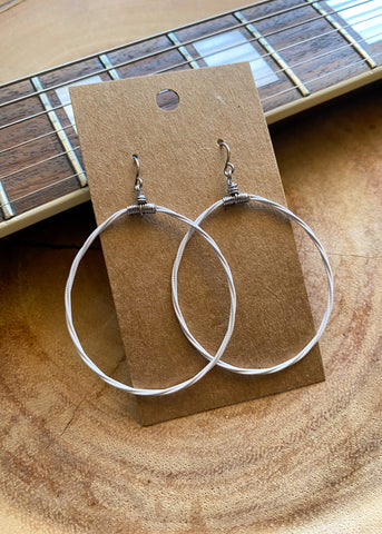 White Blacklight Phosphorescent Guitar String Teardrop Earrings