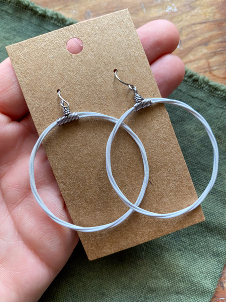 White Blacklight Phosphorescent Guitar String Hoop Earrings